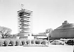 <p class='MsoNormal'>Construction of the tower and its alternating square and circle floors in progress. Construction began on November 6, 1947.</p>