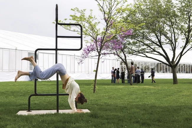 Performers precariously snooze in artist Eva Kotátková's installation <em>The Architecture of Sleep</em> at the Frieze New York art fair last weekend.<br />