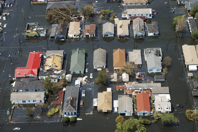 New Orleans, Louisiana, 2005. Flood waters in New Orleans, located below sea level, were slow to dissipate after levees failed during Hurricane Katrina, causing billions in damages.