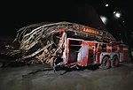 Eleven members of FDNY Ladder Company 3 died inside the North Tower when it collapsed at 10:28 a.m. The front of their truck was shorn off during the collapse.