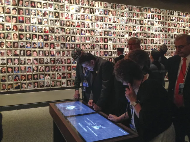Memorial exhibition with monitors where visitors can call up information on any of the 9/11 victims. <br />