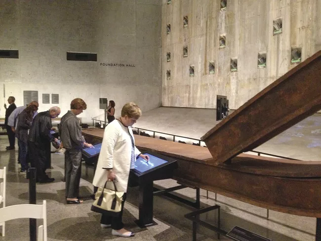 Slurry wall with monitors where visitors can leave their own memories of 9/11. <br />