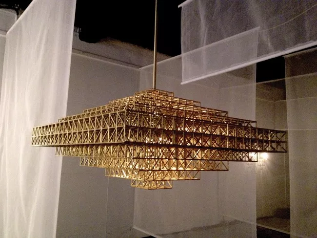 Gridlock, a beautifully crafted lighting fixture made of more than 7,000 brass pieces from Brooklyn-based Roll & Hill.