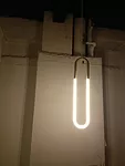Designed by Lukas Peet, Roll & Hill’s Rudi collection is meant to look like pieces of jewelry, with cold cathode lamps attached to brass-finished metal tubes.