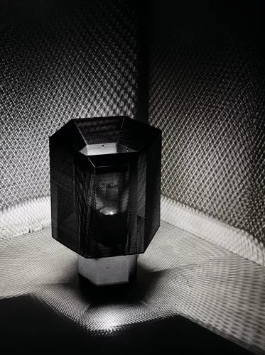 Foscarini's Hexx lamp—designed by a team at Diesel in an ongoing collaboration—exudes light through layers of perforated metal.<br /><div id='_mcePaste'>﻿﻿