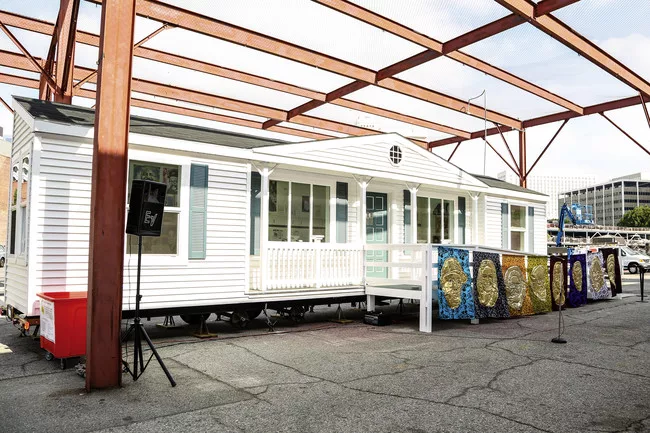 <em>Mobile Homestead</em> was developed by Kelley with Artangel and the  Museum of Contemporary Art Detroit as a community space, and is based on  the artist's childhood home in the Detroit suburb of 