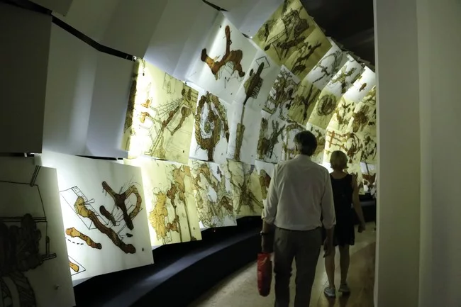 <strong>Venice Pavilion<br /><em>Sonnets in Babylon</em><br />Designer: Daniel Libeskind</strong><br /><br />Daniel Libeskind showed a series of new drawings on a curve of cascading backlit panelsR