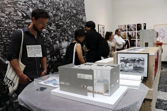 <strong>Japan<br /><em>In the Real World</em><br />Curator: Norihito Nakatani<br />Deputy Curators: Hiroo Yamagata, Keigo Kobayashi, Jin Motohashi</strong><br /><br />The sign reads: “Ito’