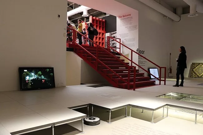 A raised floor (and a Roomba) in the Floor gallery.