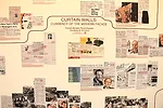 Press clippings and wall text in the Facade gallery.