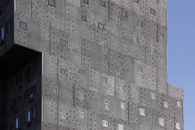 The building is clad with pre-cast concrete panels etched with abstracted images of roses, a famous symbol of Sugar Hill. <br /><div id='_mcePaste'>﻿﻿