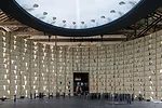 In the Bahrain pavilion a circle of bookshelves surrounds a round table showing a map of the Arab world as it was shaped over 100 years.
