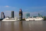 A view from the Huangpu River toward construction of Skidmore, Owings & Merrill’s White Magnolia Plaza in the North Bund. Two towers dominate the mixed-use complex. One has already reached its f