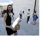 Sarah Nielsen Claypool, a representative from 3M, shows off the reflective molds that were used to create the bricks for The Living's instllation at MoMA/P.S.1.