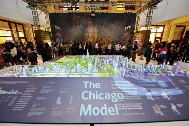At the Chicago Architecture Foundation's exhibition on big data, a resin model of Chicago has been digitally enhanced to project statistics on everything from demographics to tweets.<div id='_mcePas