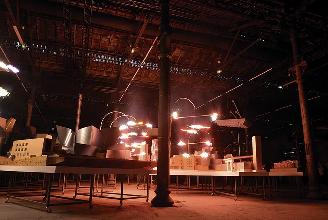 Gunpowder-equipped mobiles by artist Cai Guo-Qiang illuminate models of Frank Gehry's work in <em>Solaris Chronicles</em>, an exhibition at the future site of LUMA Arles.<div id='_mcePaste'>&#