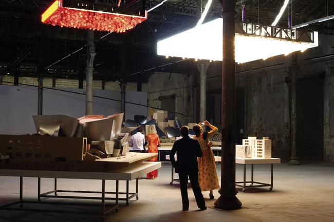Work by Philippe Parreno illuminates models.<br /><div id='_mcePaste'>