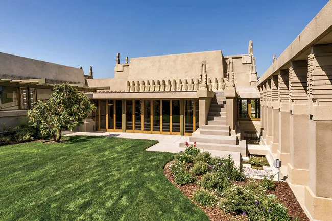 The house surrounds a garden courtyard.