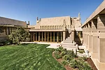 The house surrounds a garden courtyard.