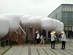 Moon Ji Bang's installation is made of 60 cloud-shaped balloons.