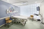 Perkins Eastman replaced the 8-by-8-inch glass bricks in the podium, which bring soft daylight into some exam rooms. The curved glass  walls create bigger rooms too.<br /><div id='_mcePaste'>﻿&