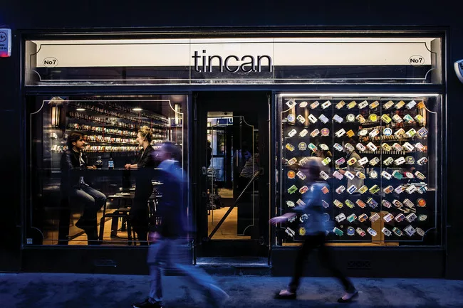 Tincan, an ongoing Soho pop-up restaurant conceived and operated by architect AL_A, offers a menu comprising 25 varieties of canned seafood, from humble sardines to $35 scallops. The colorful packagin