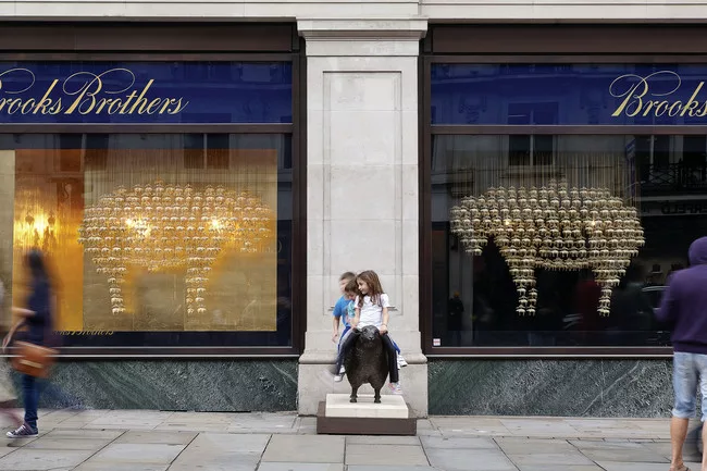 Squire & Partners’ lustrous installation for Brooks Brothers—one of 15 temporary window displays by architects for Regent Street retailers—referenced the Golden Fleece, a historical 