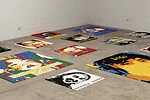 For <em>Trace</em>, the artist paved the large concrete hall of the New Industries Building with 176 Lego portraits of political exiles and prisoners.