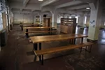 In the prison dining room, <em>Yours Truly</em> invites Alcatraz’s visitors to write messages on postcards pre-addressed to prisoners of conscience around the world.