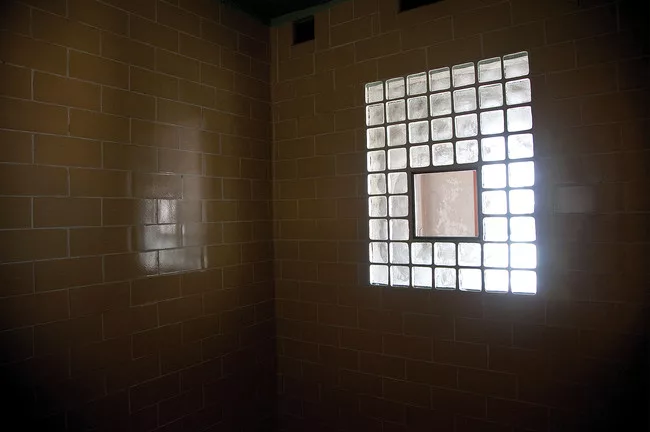 <em>Illumination</em> pipes sound into the pair of inhumanly small psychiatric observation chambers in the prison hospital. Recorded chants of exiled Tibetans resonate with the Hopi tribal song playin