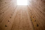 Even the building’s core, its primary lateral-load resisting system, is wood. The core consists of cross-laminated timber panels.