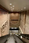 <p>The Corbin Building provides another point of access from the street to the subway platforms  by way of a set of escalators that dramatically descend 20 feet below  Corbin’s original foundati