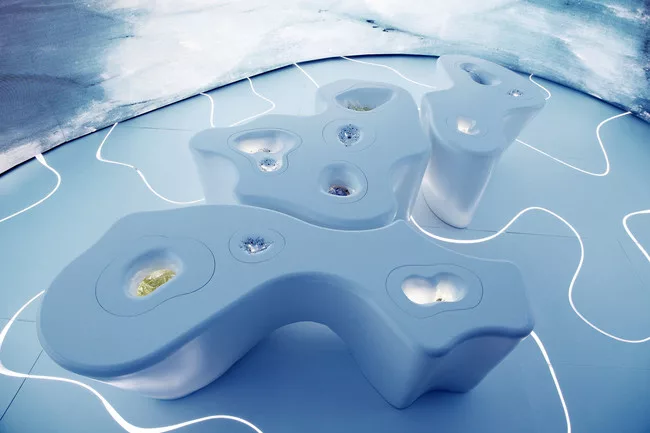 Jeanne Gang has an installation just outside the Collectors Lounge, commissioned by Swarovski. “Thinning Ice” includes tables by the architect, and a video and photography by James Balog,