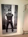 In a men's bathroom at the Bass Museum, a photo of Peter Marino suggests the room's use.<div id='_mcePaste'>﻿﻿
