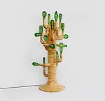 Studio Swine, <em>Cactus Light </em>(2012)<br />Pine offcuts, bottle bulbs, LED light, brass fittings, fabric cable. Courtesy of Coletivo Amor de Madre. UK.<div id='_mcePaste'>﻿﻿