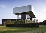 Lu Jun, the developer of the China International Practical Exhibition of Architecture—a collection of buildings near the city of Nanjing, including the Sifang Art Museum by Steven Holl—say
