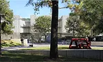 View of the Nancy and Rich Kinder Building Restaurant Entrance from the Lillie and Hugh Roy Cullen Sculpture Garden.