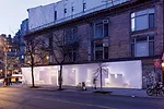 The facade for the <em>BLUEPRINT</em> exhibition was tagged with graffiti soon after it opened.<div id='_mcePaste'>﻿﻿