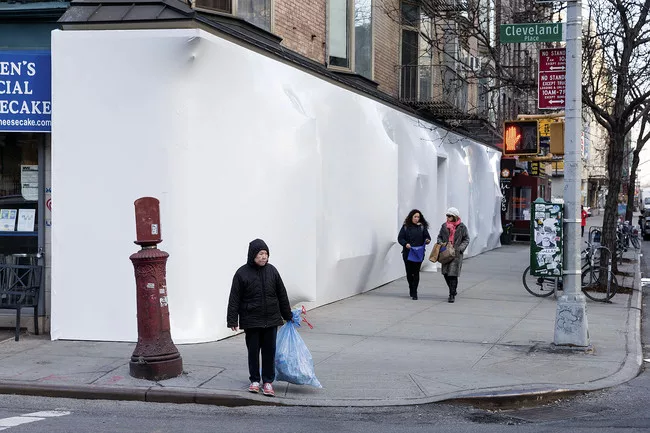 The facade for the <em>BLUEPRINT</em> exhibition was tagged with graffiti soon after it opened.<div id='_mcePaste'>