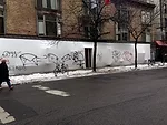 The facade for the <em>BLUEPRINT</em> exhibition was tagged with graffiti soon after it opened.<div id='_mcePaste'>﻿﻿