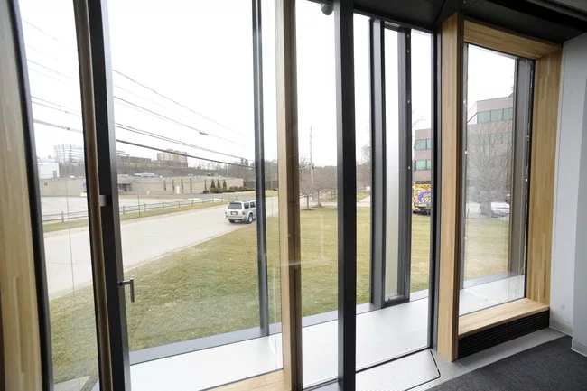 Dozens of designs for sliding glass doors that will allow workers to step onto the cavity catwalk were tested fore ease of operation.<div id='_mcePaste'>
