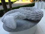 Raffaello Galiotto used a numerical control cutter with a spherical tool to shape Carrara marble into a two-headed serpent.