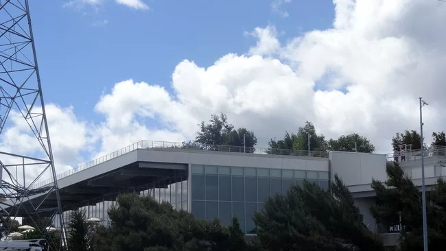 The facility includes a 9-acre rooftop park, barely visible from the ground.