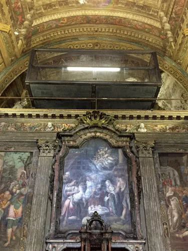 Protruding through an open arch over the alter in the deconsecrated church of San Paolo Converso is the conference room of CLS Architetti's new offices.