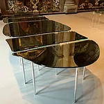 Massimiliano Locatelli's new table for Glas Italia, made entirely of glass, was exhibited in the architect's new offices inside the church of San Paolo Converso.