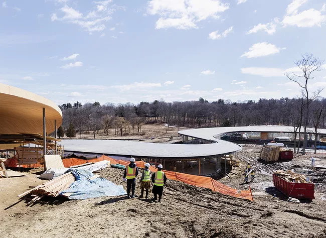 Shown here under construction in late March, the 86,000-square-foot structure will be surrounded by a landscape designed by OLIN in collaboration with SANAA.<div id='_mcePaste'>﻿﻿
