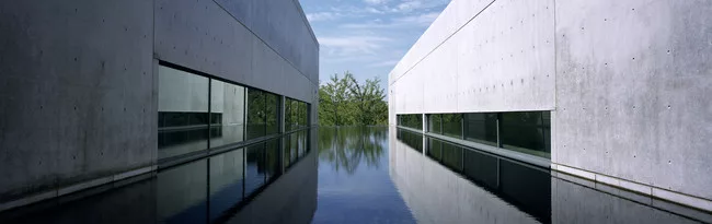 One of the signature features of the building, both before and after the recent renovation, is a water court that reflects sunlight into the galleries.