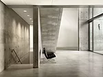 The new below-grade galleries are accessed by a stair that descend from the building’s water court entry.