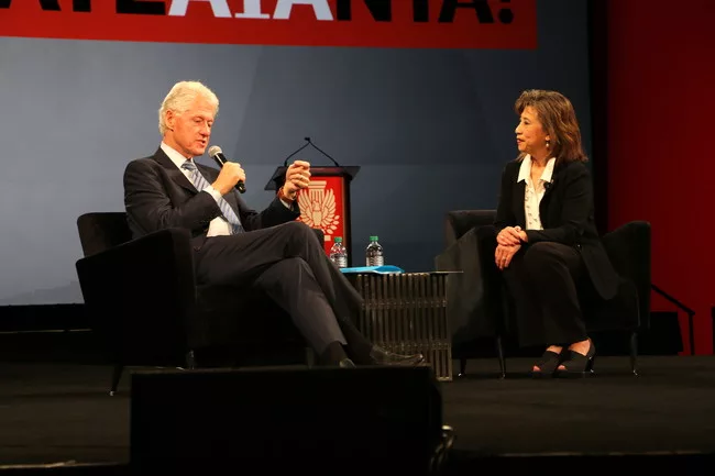 Bill Clinton speaks with AIA President Elizabeth Chu Richter.<div id='_mcePaste'>﻿﻿