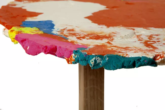 Stephen Johnson created synthetic dough for this colorful tabletop in the new Play collection for Decode.<div id='_mcePaste'>
